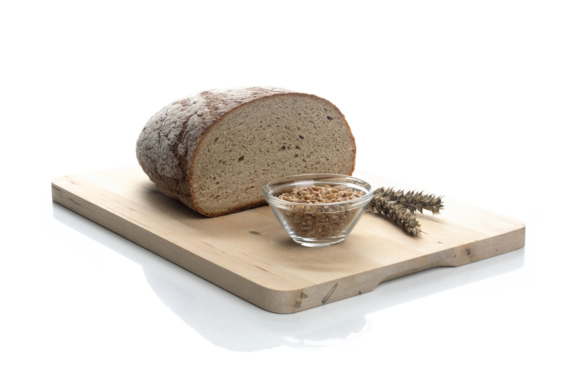 Rustic bread and spread on board